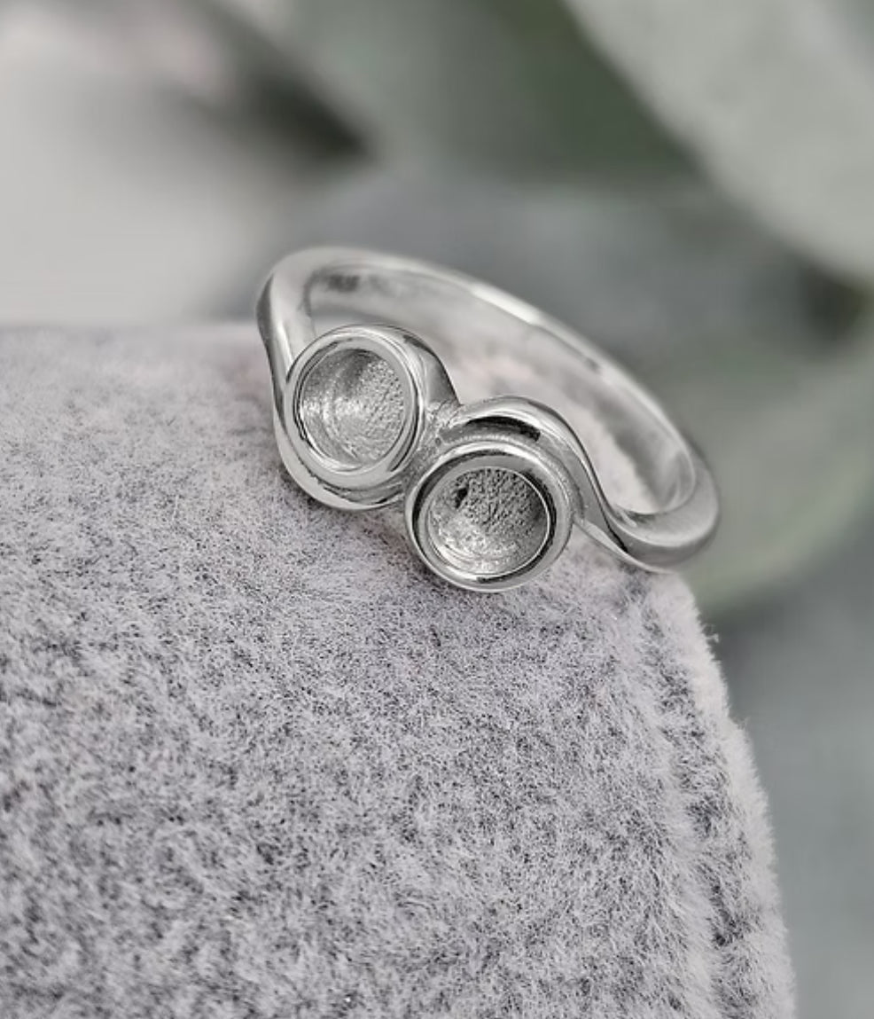 Waved double bezel ring