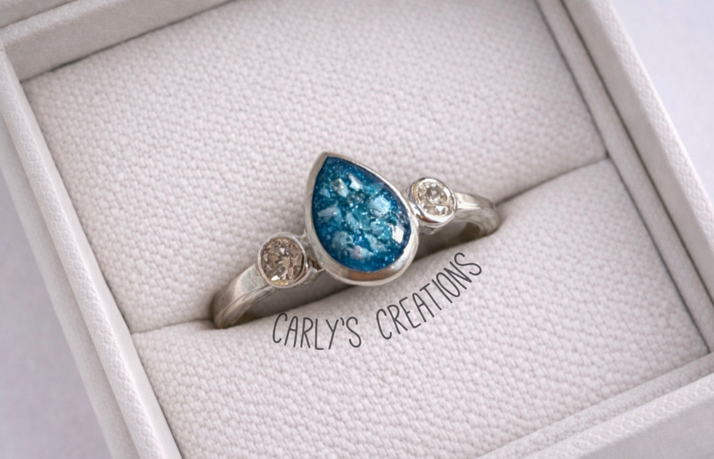Double gem teardrop memorial ring