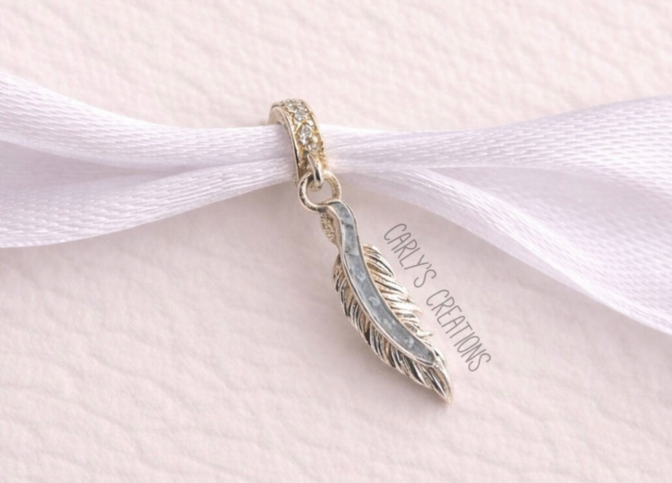 Feather charm